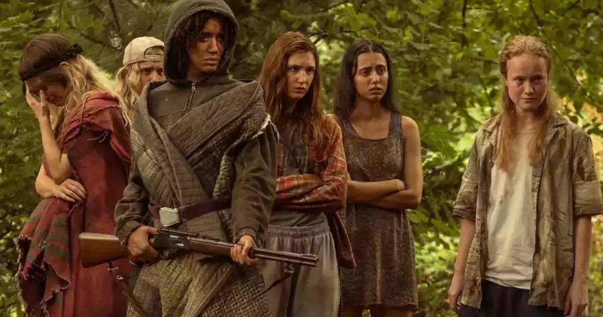 Yellowjackets Season 3 First Look Photos Tease a Funeral, Fractured Survival Group, & More 1 Yellowjackets Season 3 First Look Photos Tease a Funeral, Fractured Survival Group, & More